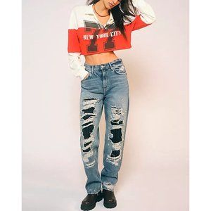 Free People Distressed Straight Leg Jeans in Medium Blue with Black Patches